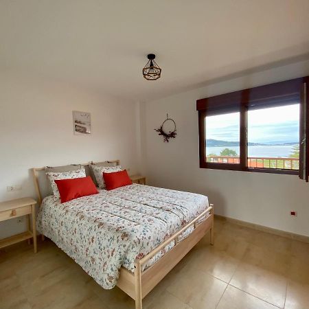 Apartamentos A Lanzada ปอนเตเบดรา ภายนอก รูปภาพ