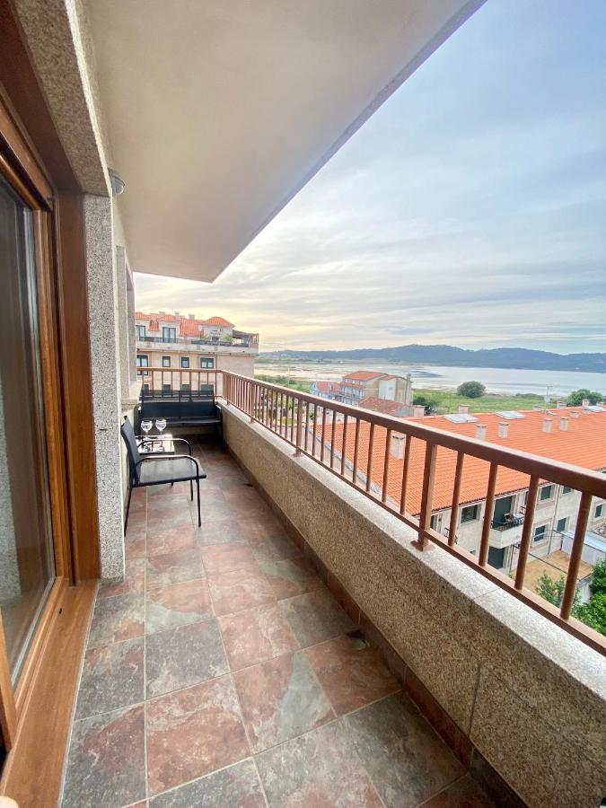 Apartamentos A Lanzada ปอนเตเบดรา ภายนอก รูปภาพ