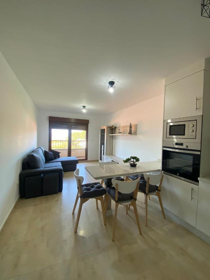 Apartamentos A Lanzada ปอนเตเบดรา ภายนอก รูปภาพ